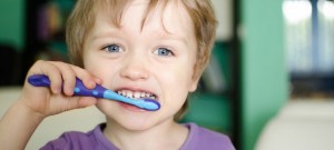 Lincoln Pediatric Dentistry - boy brushing teeth